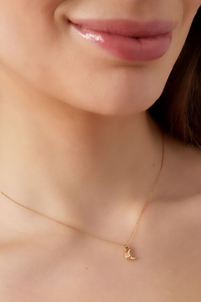 Simple necklace with crescent moon charm and diamond